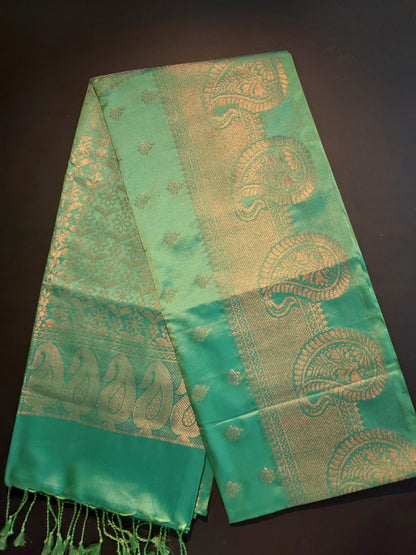 Dark Green with self border soft semi silk saree.