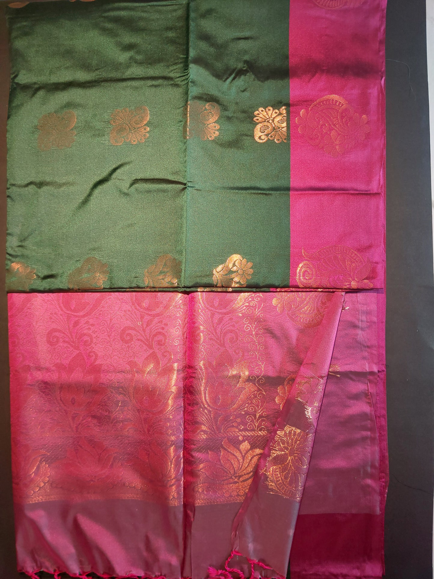 Dark Green with Dark Pink border soft semi silk saree.