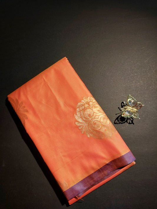 Orange with purple pet border soft semi silk saree.