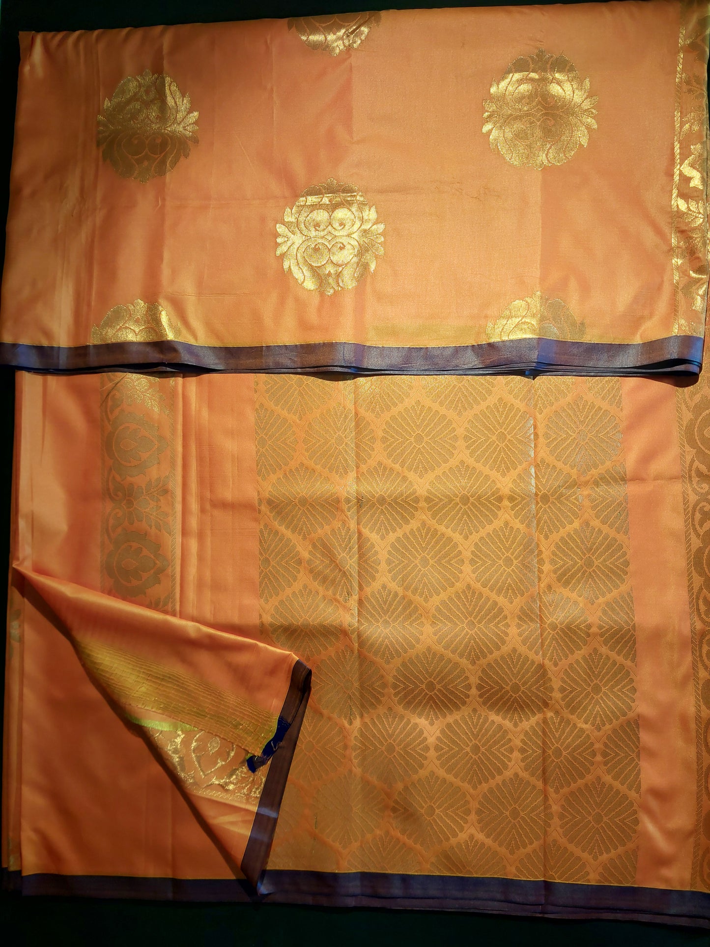 Orange with purple pet border soft semi silk saree.