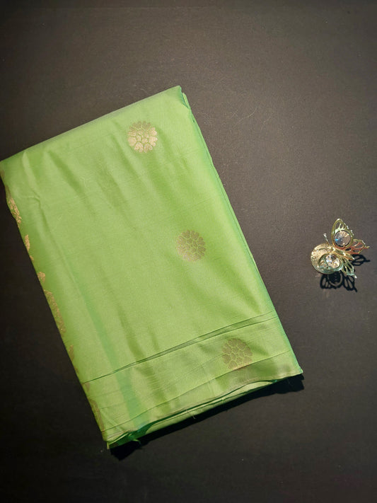 Parrot green borderless soft semi silk saree